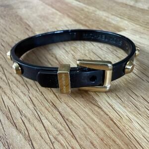 Michael Kors Astor Black and Gold-Tone Hinged Buckle Bangle Bracelet